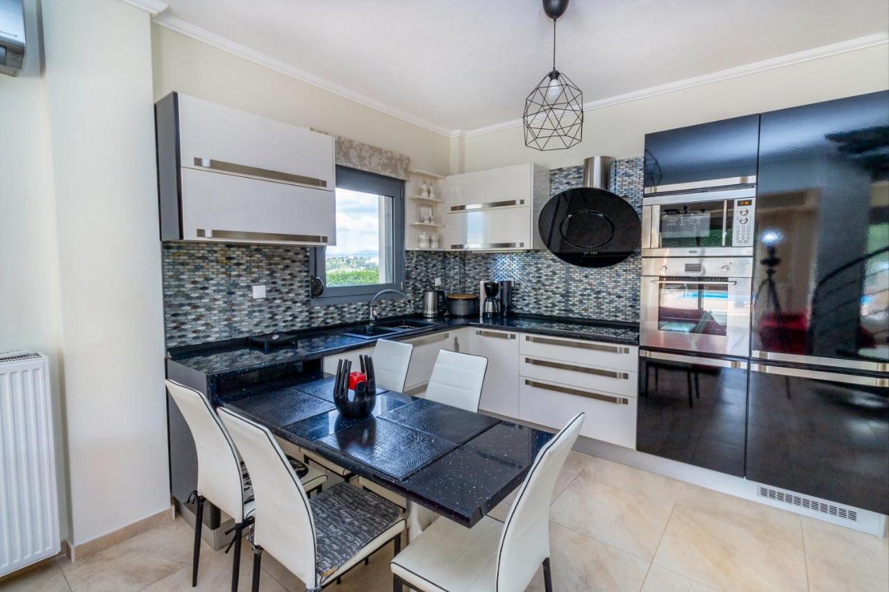 Nefeli & Dina Villas By Diomedes Group ネア・ムダニア エクステリア 写真